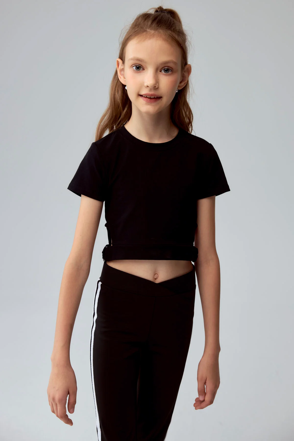 Polera Niña Argolla Costado Negro