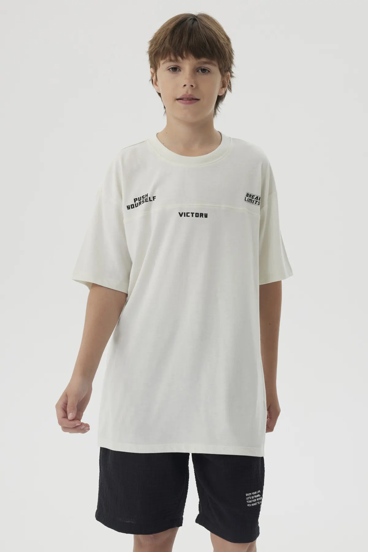 Polera Niño Costura Frontal Crudo